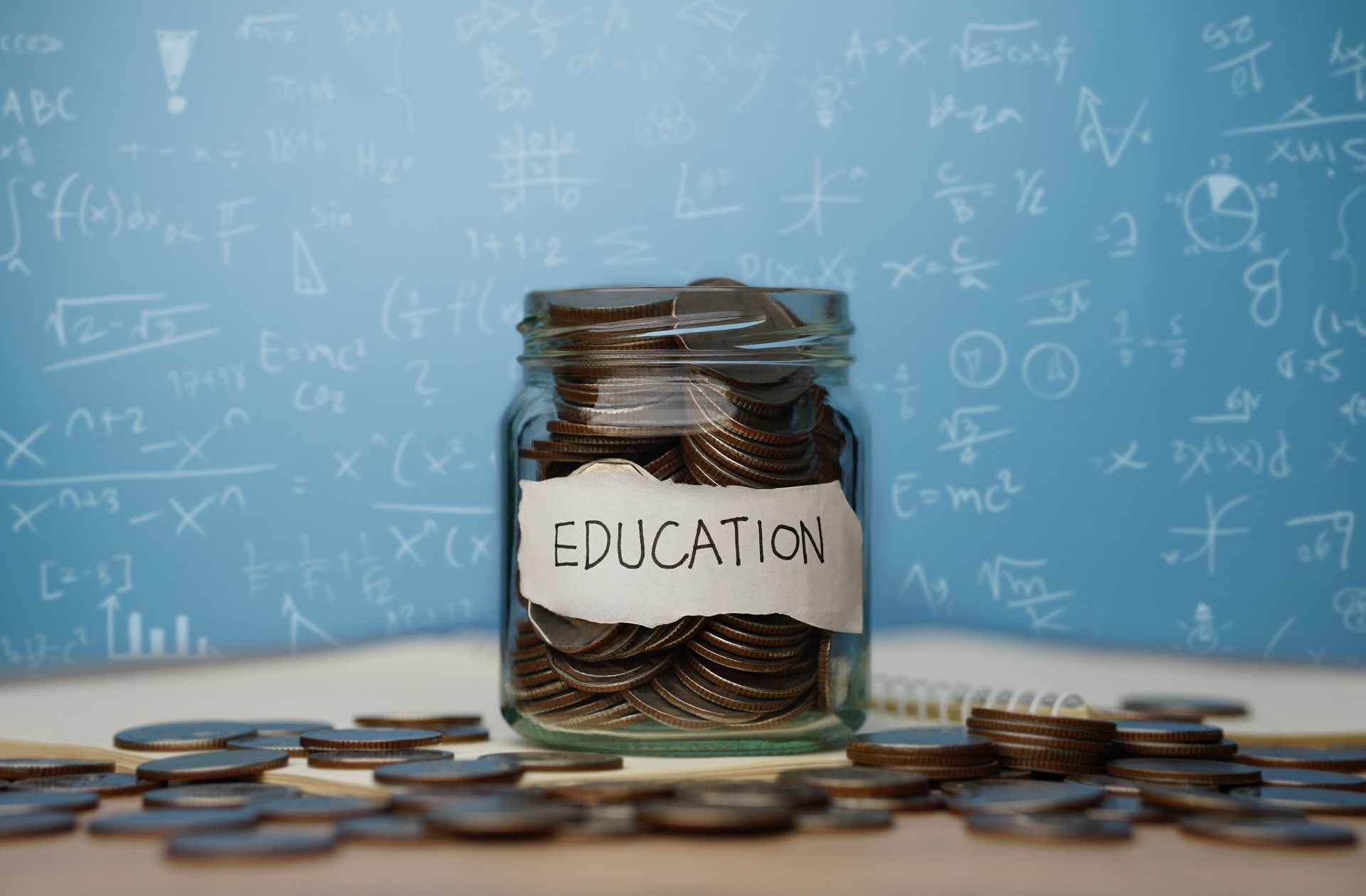 Student success concept and investment in education, long-term financial returns, future career growth, silver medals and books.